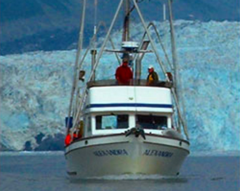 The Alexandra cruising Prince William Sound with Glaciers in the background